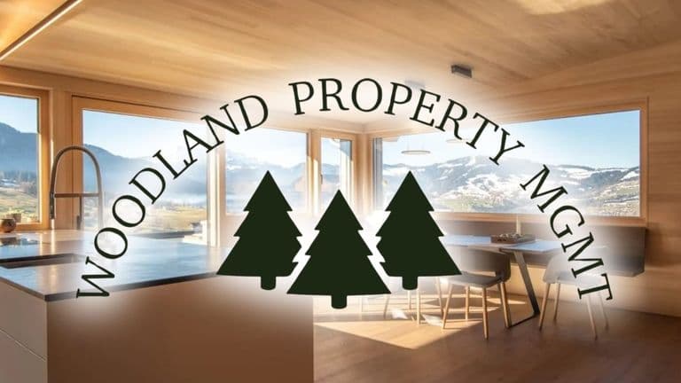 Woodland Property Mgmt logo over modern mountain-view interior.