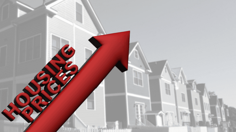 Red upward arrow labeled "Housing Prices" in front of residential homes.