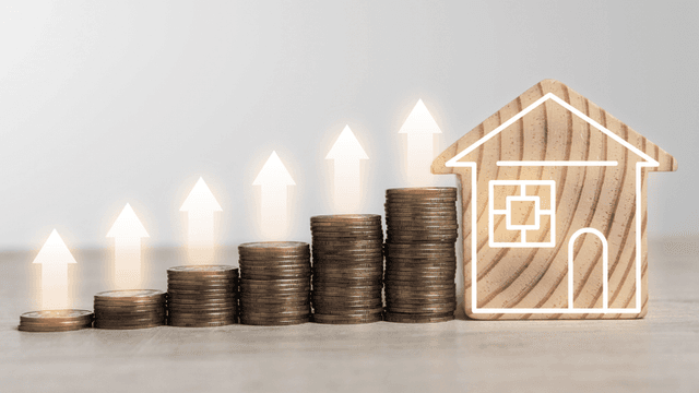 Stacks of coins with an upward trend and a wooden house icon