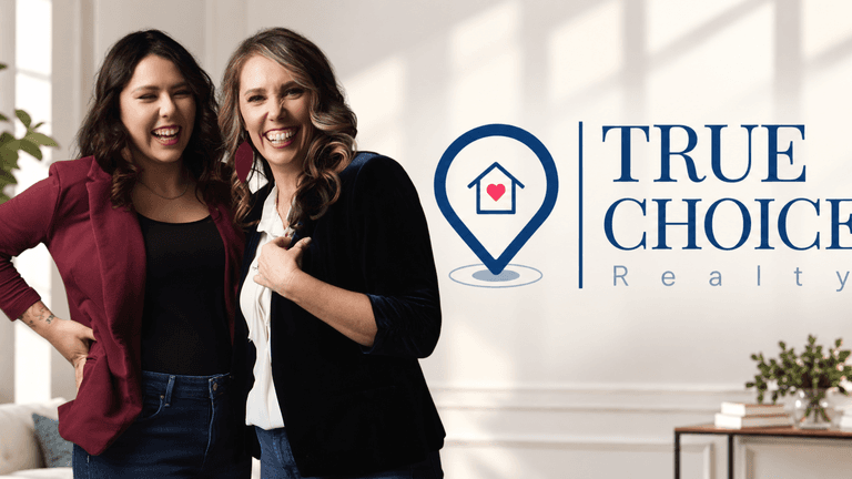 Two women smiling in a bright interior, next to "True Choice Realty" logo