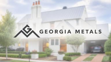 Georgia Metals logo displayed over a modern home featuring a light-colored metal roof.