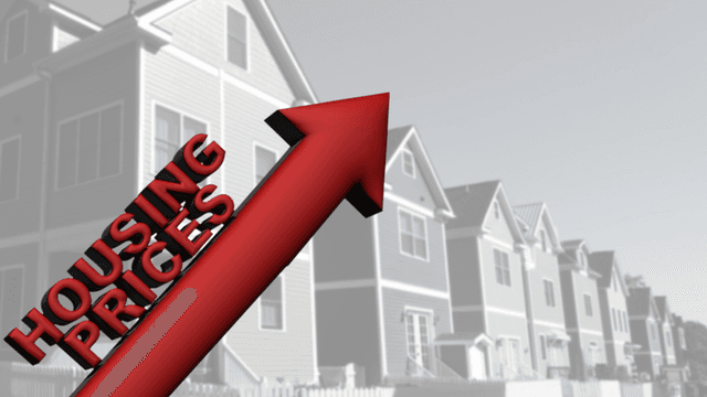 Red upward arrow labeled "Housing Prices" in front of residential homes.
