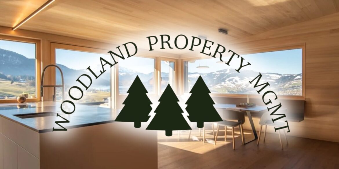 Woodland Property Mgmt logo over modern mountain-view interior.